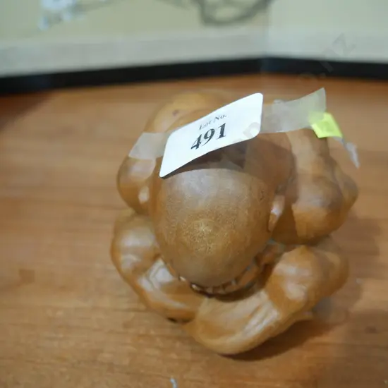 Wooden weeping monk ornament