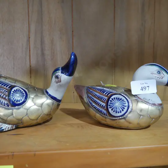 2 duck ornaments