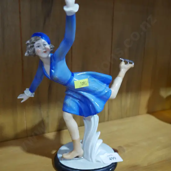 Ice skating lady figurine