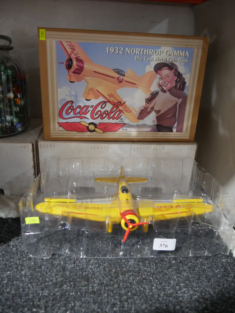Coca-Cola boxed diecast metal plane money box Image 1++
