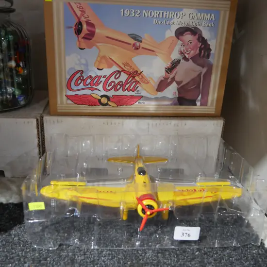 Coca-Cola boxed diecast metal plane money box