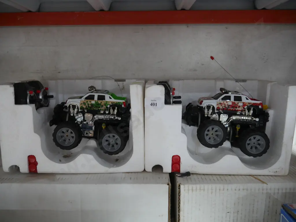 Two RC monster trucks Image 1++