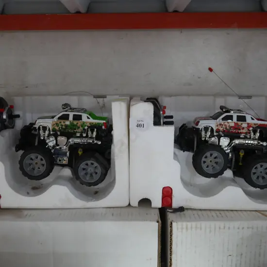 Two RC monster trucks
