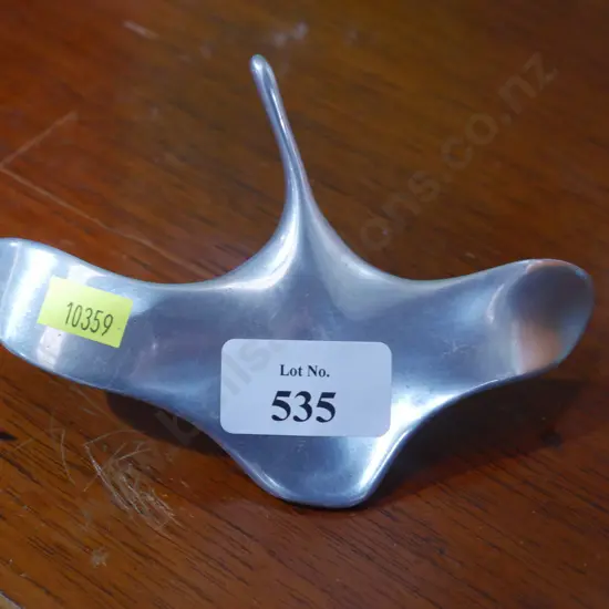 Signed metal ornament