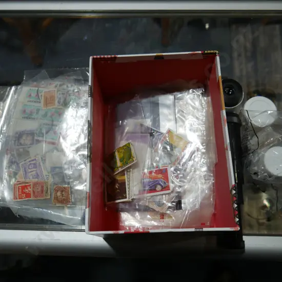 Stamps and telescope lenses