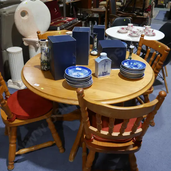 Dining table on four chairs