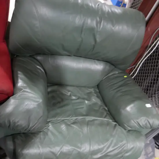 Green leather recliner armchair