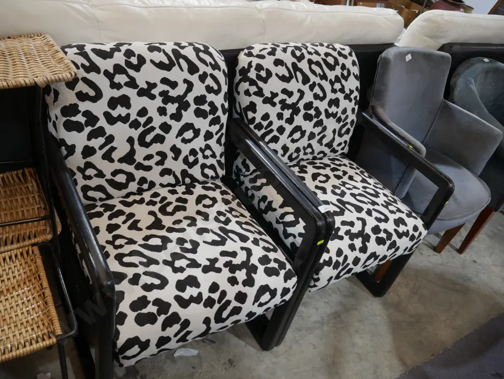 Pair of black and white leopard print armchairs Image 1++