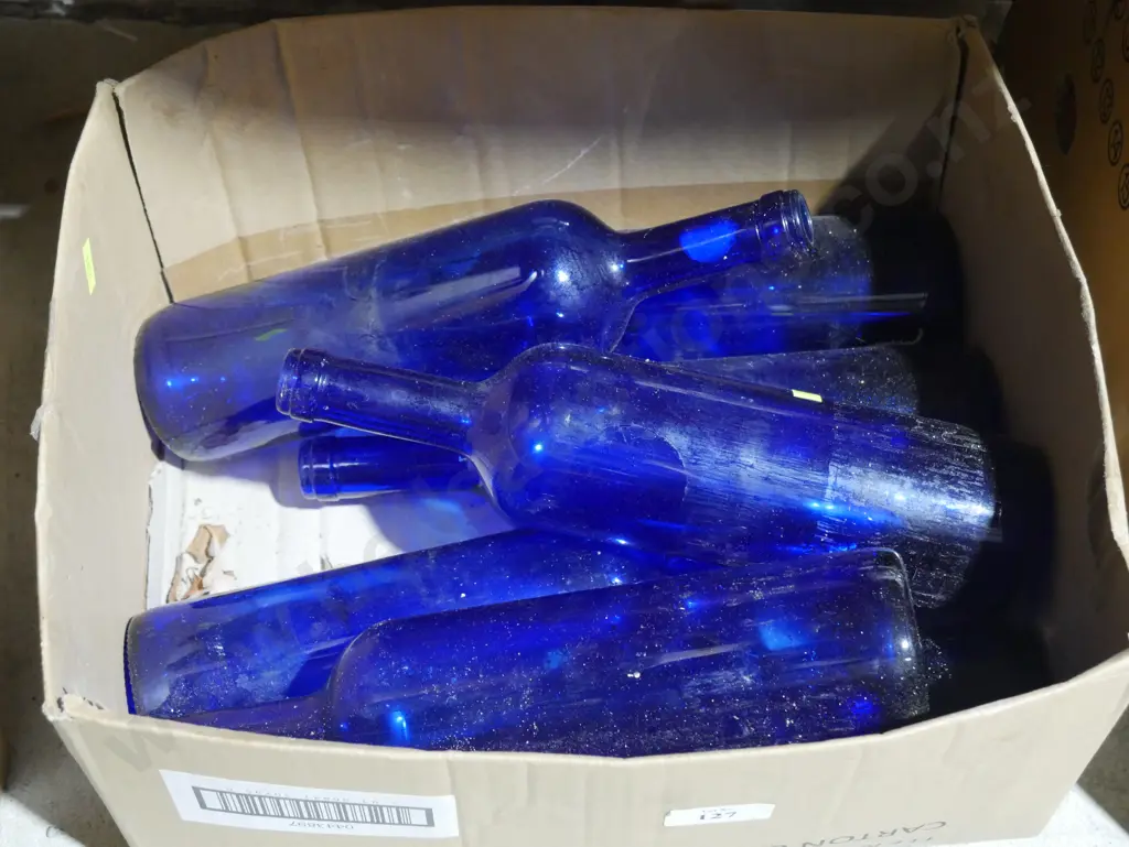 Blue glass bottles Image 1++