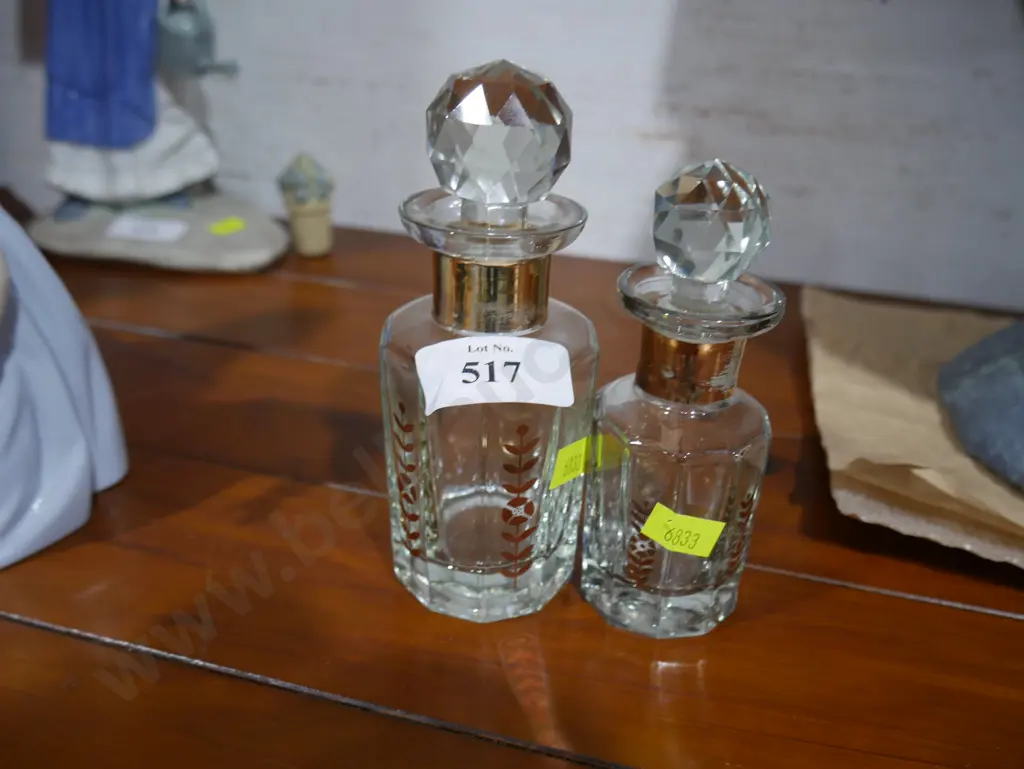 2 small lidded bottles Image 1++