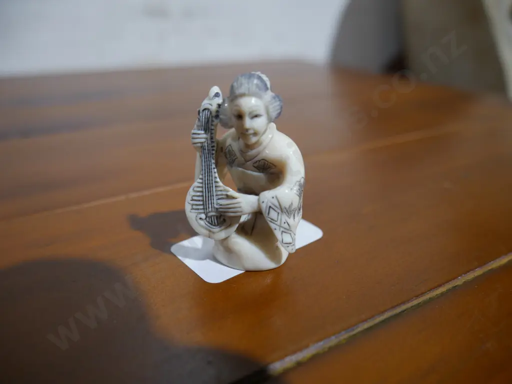 Ivory figure Image 1++