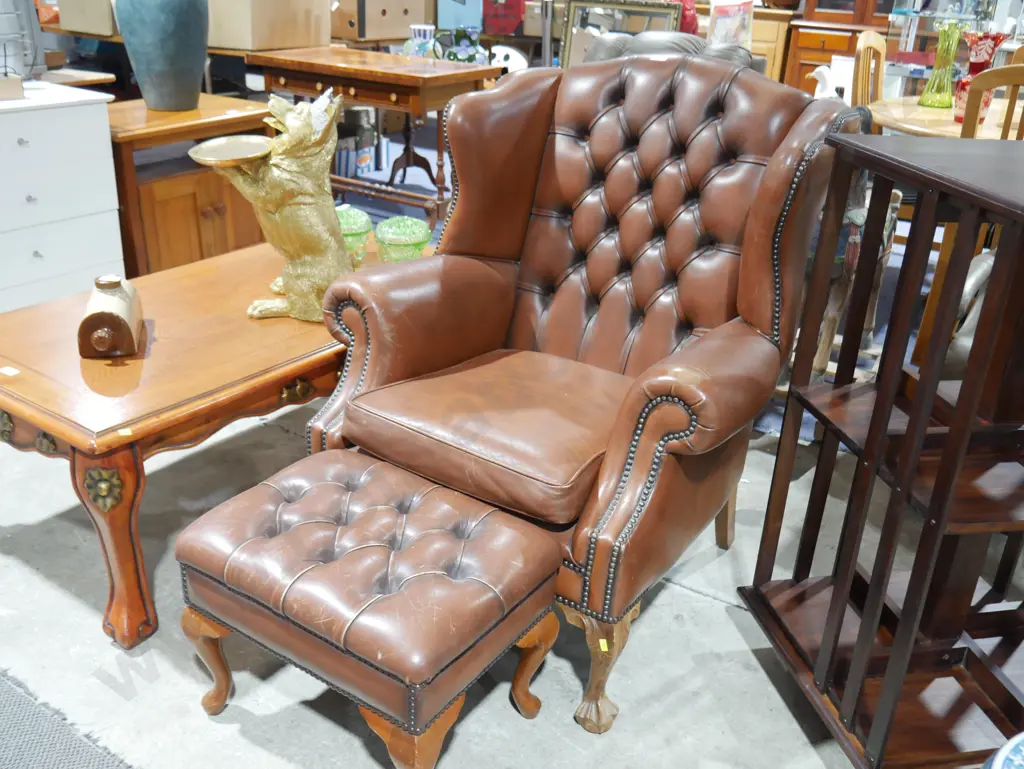 Leather arm chair and footstool Image 1++