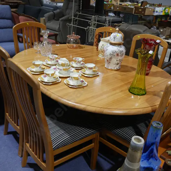 Oval extension dining table and chairs