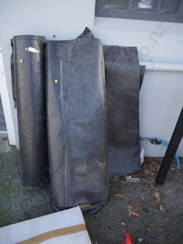 Rolls of black plastic Image 1++