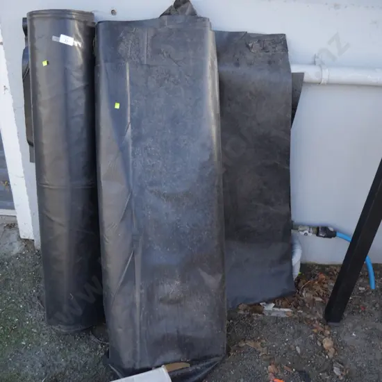 Rolls of black plastic