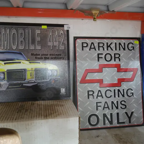 Two tin signs