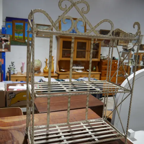 Folding metal shelf