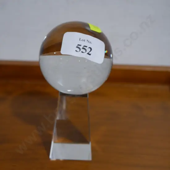 Glass ball on stand