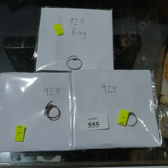 Three silver rings