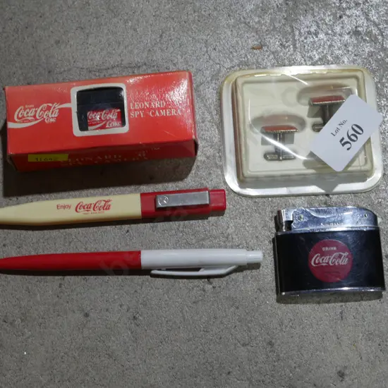 Coca-Cola cufflinks, lighter etc