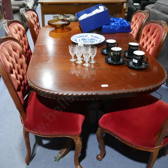 Rope edge extending dining table and six deep buttoned chairs