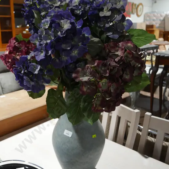 Vase and artificial flowers