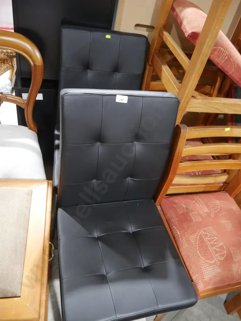 Two black dining chairs Image 1++