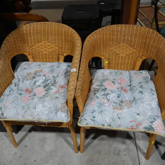 2 cane armchairs
