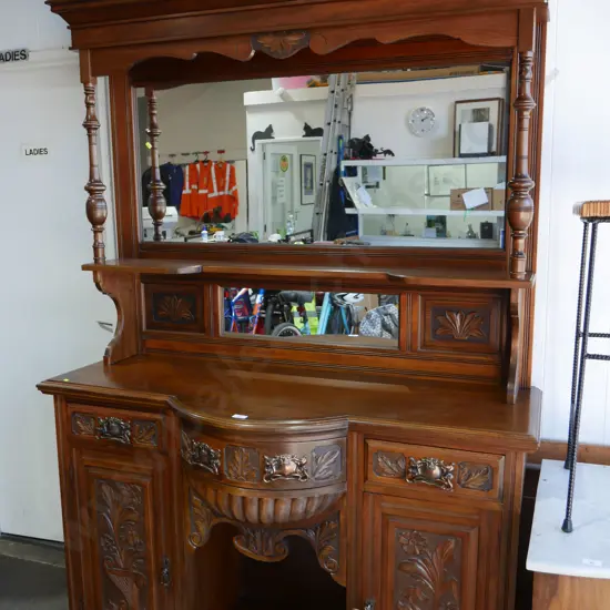 Carved mirror back sideboard