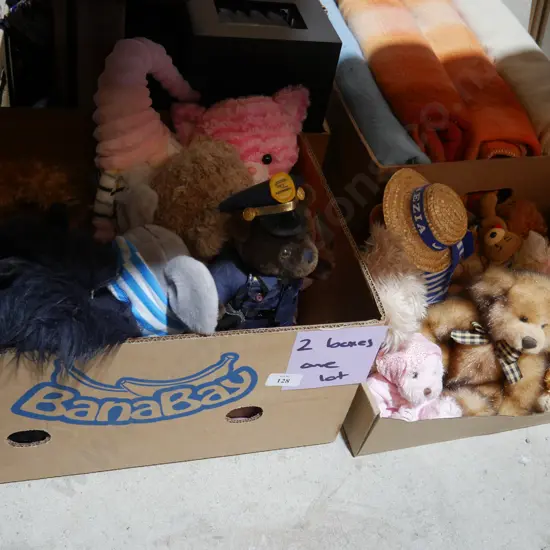 Two boxes of soft toys