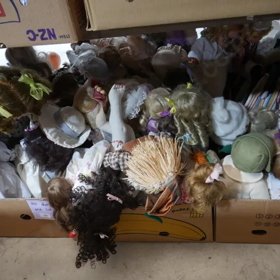Three boxes of dolls