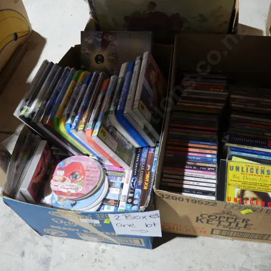 Two boxes of CDs and DVDs