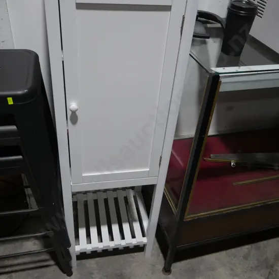 Storage cupboard with shelf
