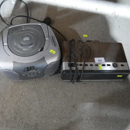Portable radio alarm clock