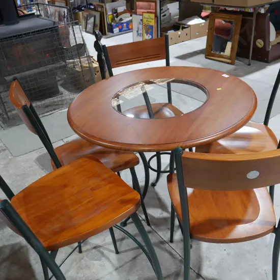 Dining table and four chairs plus barstool