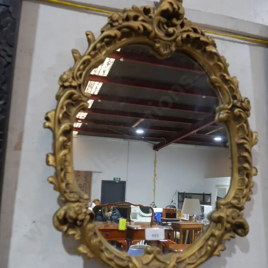Oval ornate gilt frame mirror