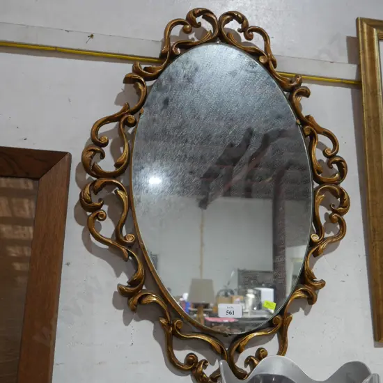 Ornate gilt framed mirror