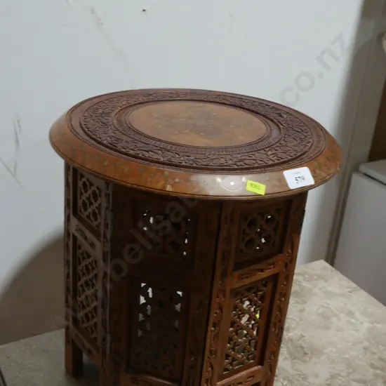 Carved wooden side table