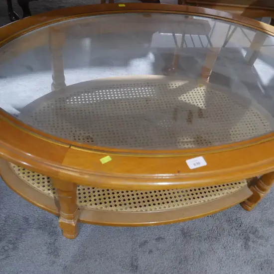 Glass top oval coffee table