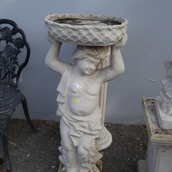 Statue bird bath