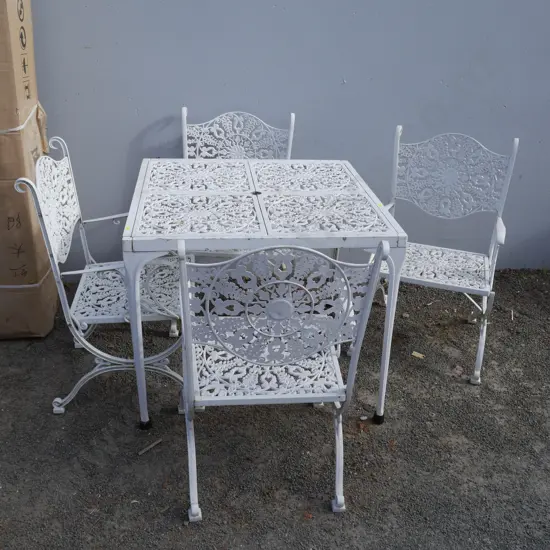 White metal outdoor table and 4 chairs