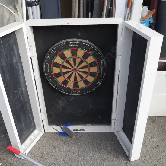 Dartboard in cabinet