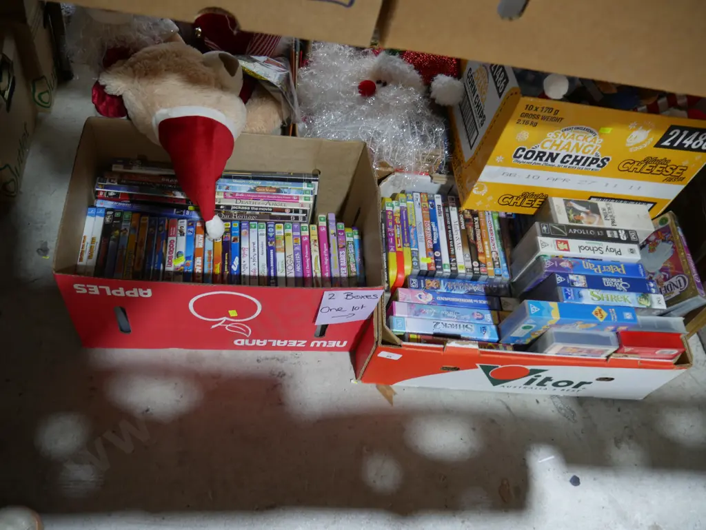 Two boxes of DVDs and videos Image 1++