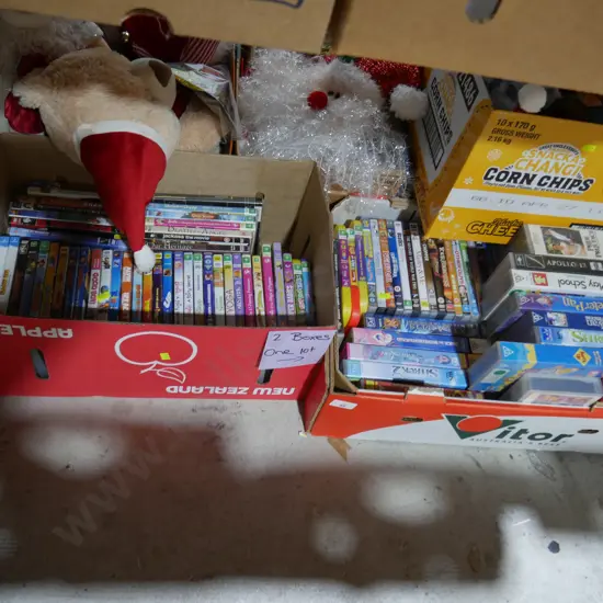 Two boxes of DVDs and videos