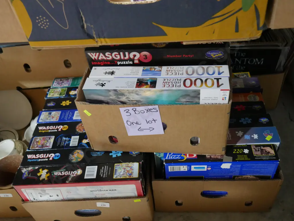 Three boxes of jigsaw puzzles Image 1++