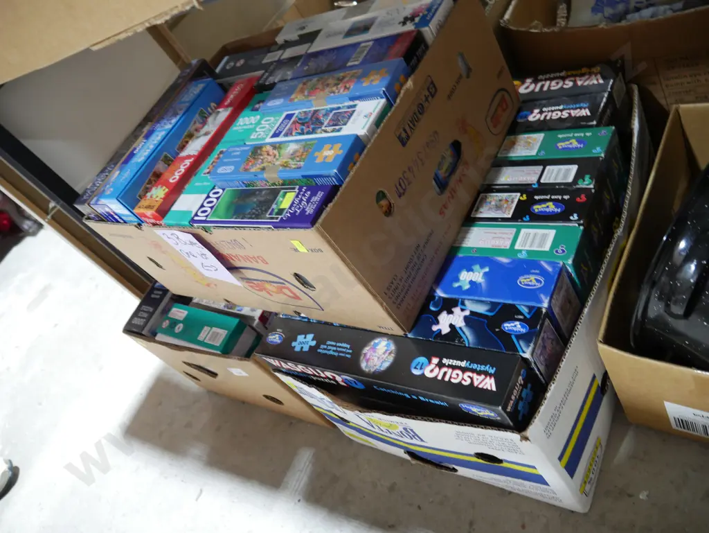 Three boxes of jigsaw puzzles Image 1++