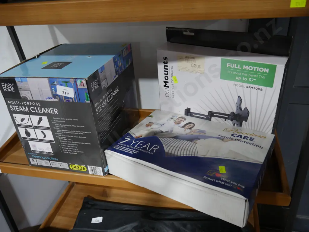 Steam cleaner, TV wall mount, fabric protector Image 1++
