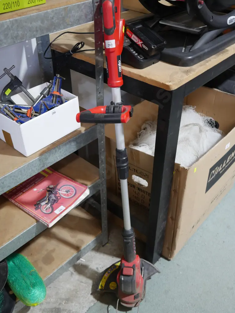 Ozito battery line trimmer with charger and battery Image 1++