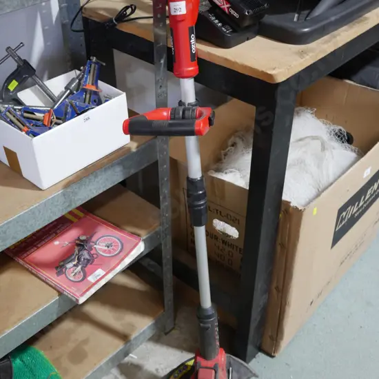 Ozito battery line trimmer with charger and battery