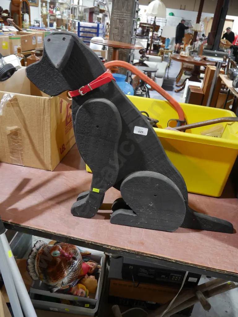 Wooden sitting dog sculpture Image 1++